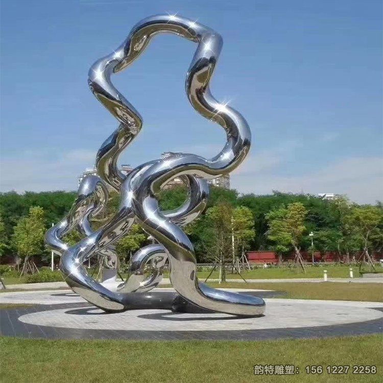 廣場不銹鋼鏡面飄帶雕塑，扭曲飄帶絲帶雕塑造型